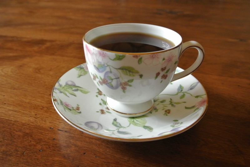 Tea in floral teacup and saucer